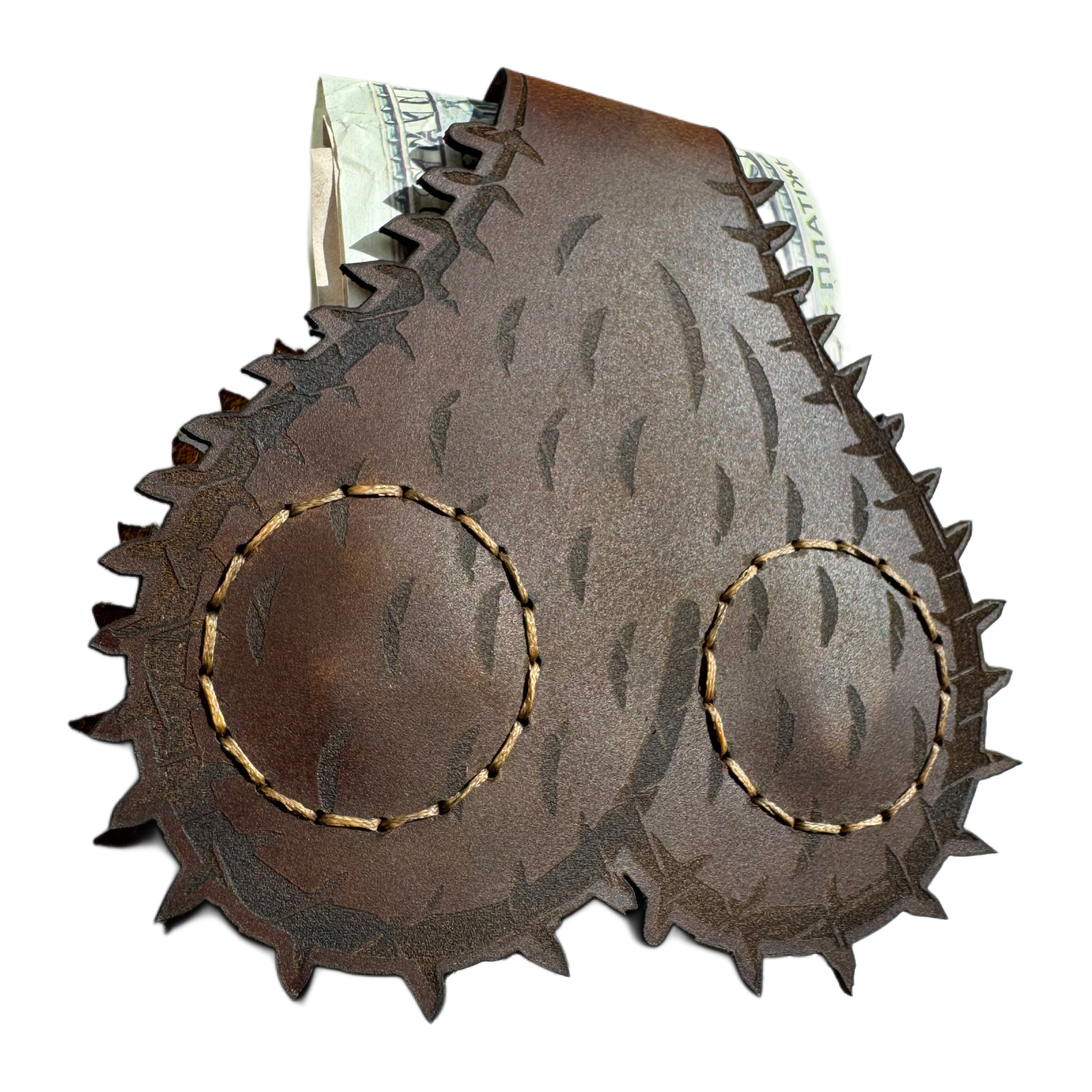 Spiky leather coin pouch with folded bill