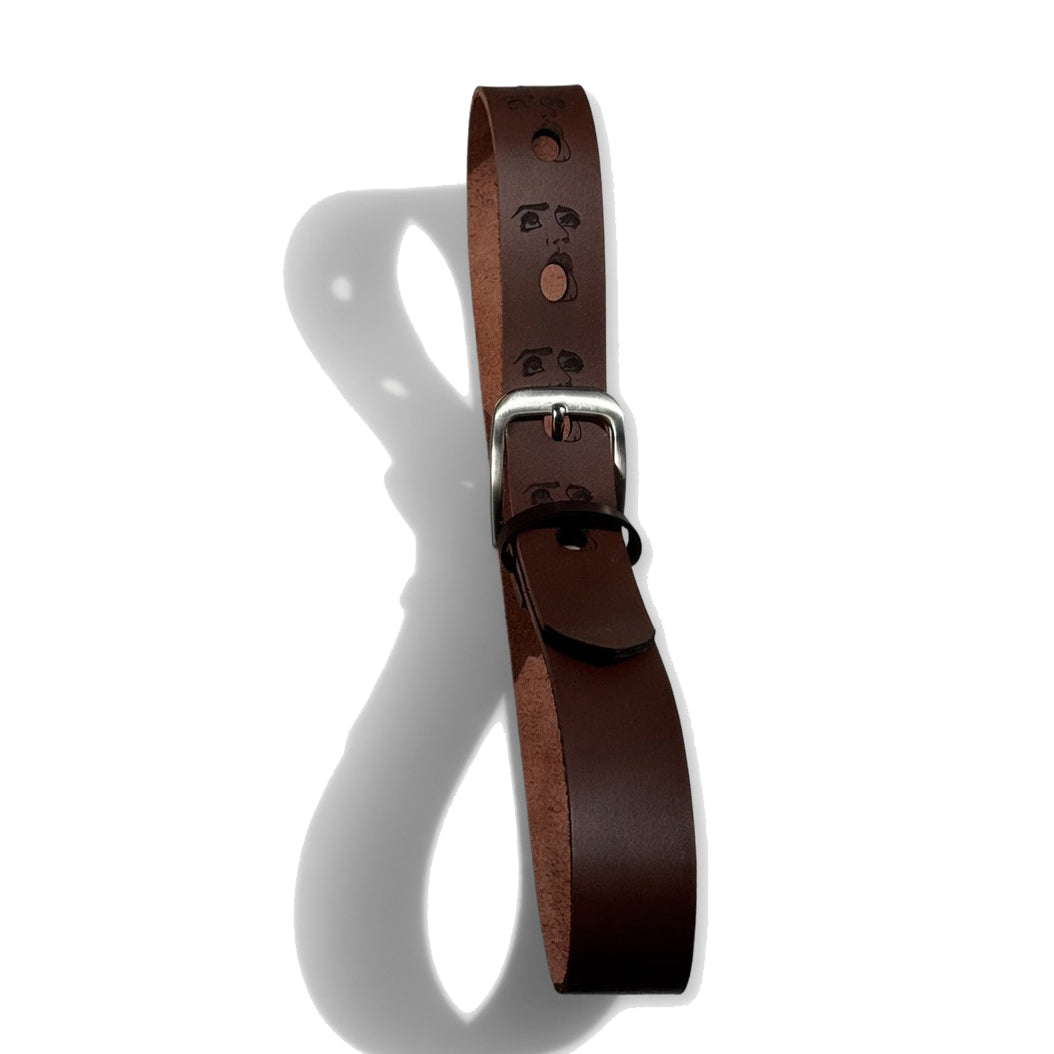 Brown handcrafted engraved leather belt — detail view — Lamamarka