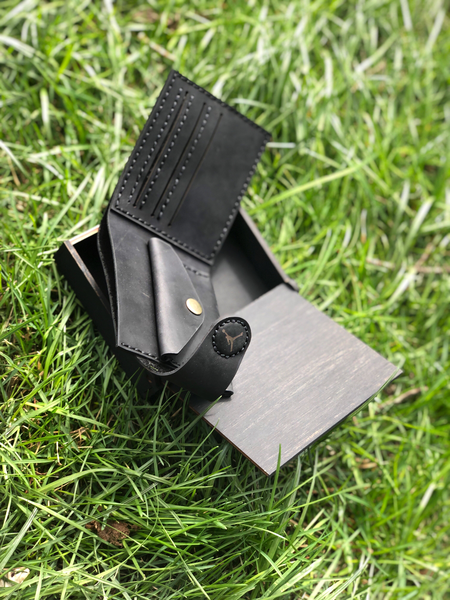 Engraved handcrafted leather wallet — alternate angle — Lamamarka