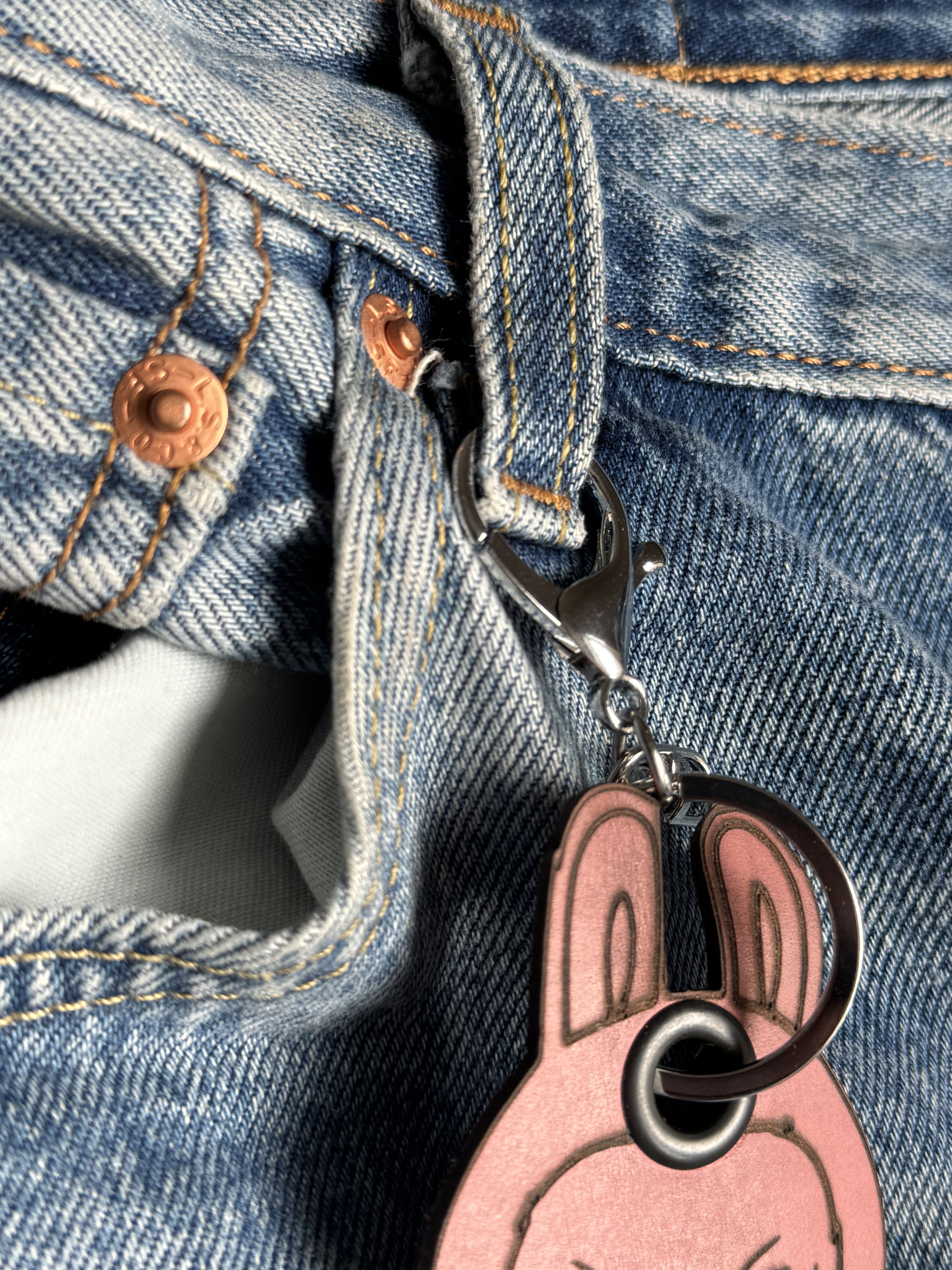 Handcrafted leather character keychain — alternate angle — Lamamarka
