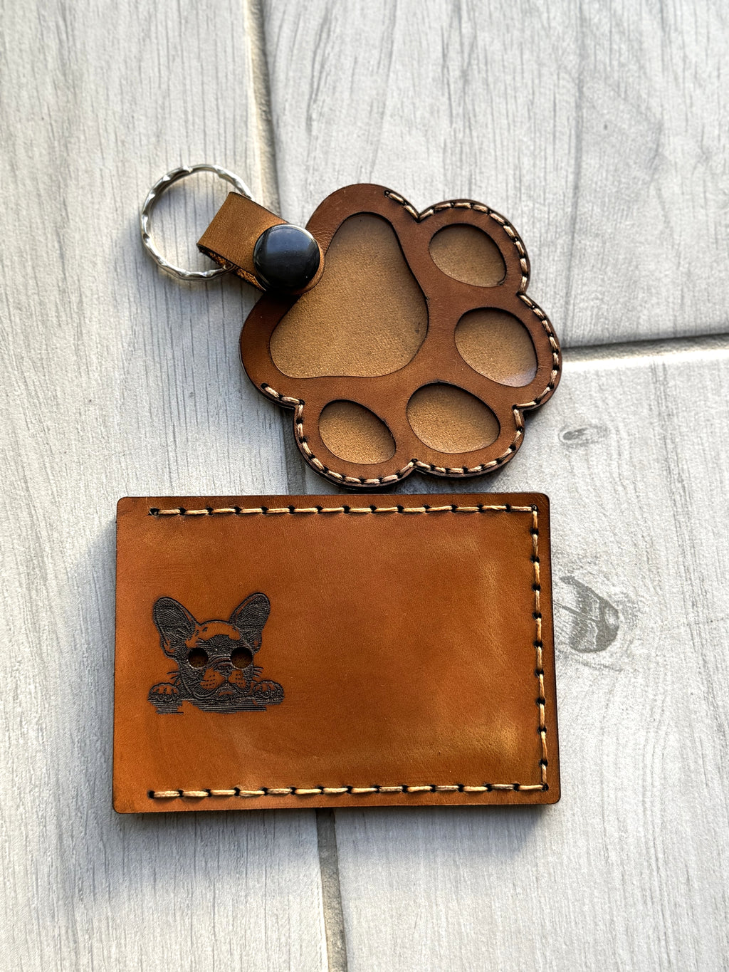 Leather paw print pet memorial keychain keepsake — alternate angle — Lamamarka