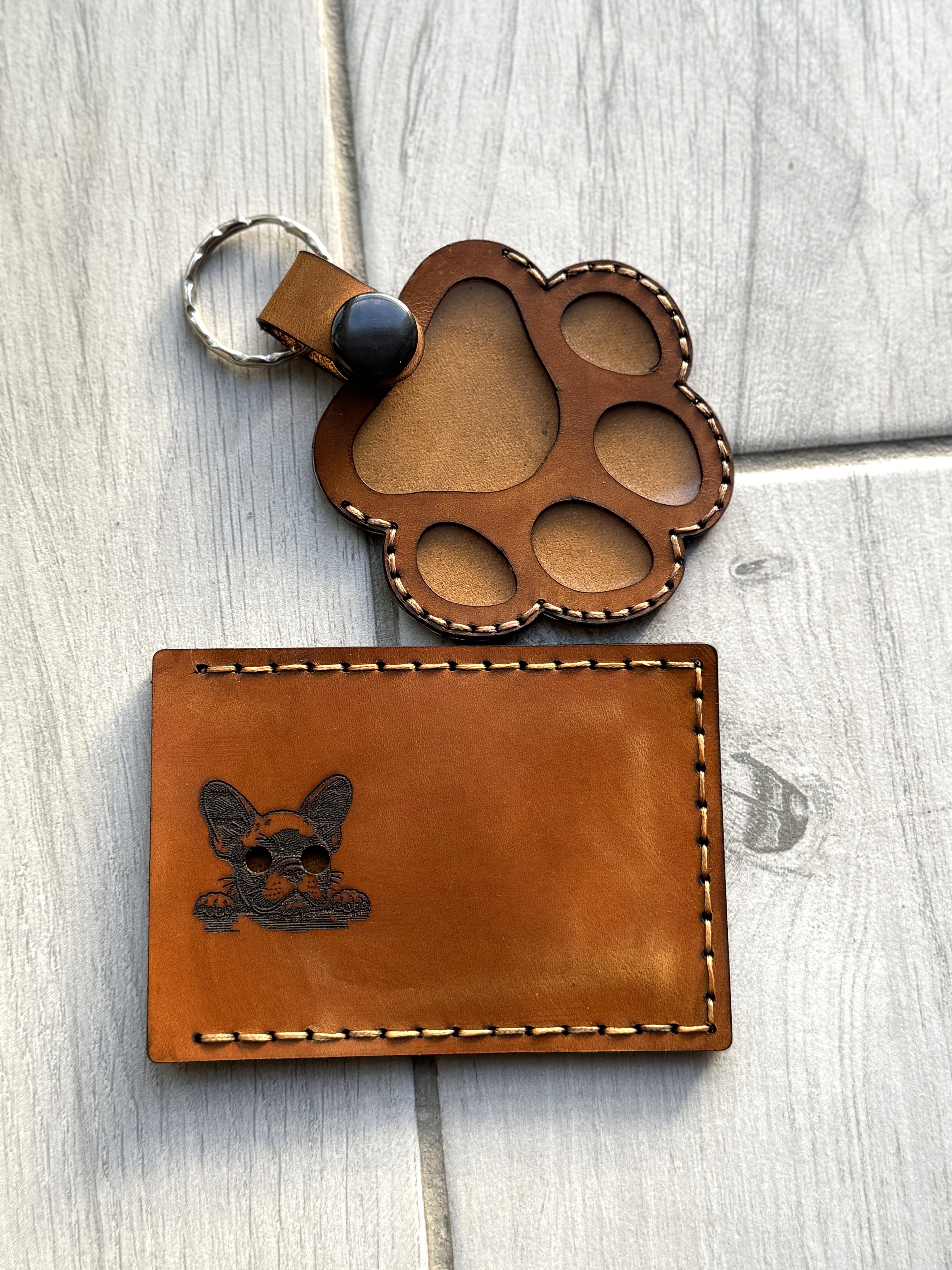 Leather paw print pet memorial keychain keepsake — alternate angle — Lamamarka
