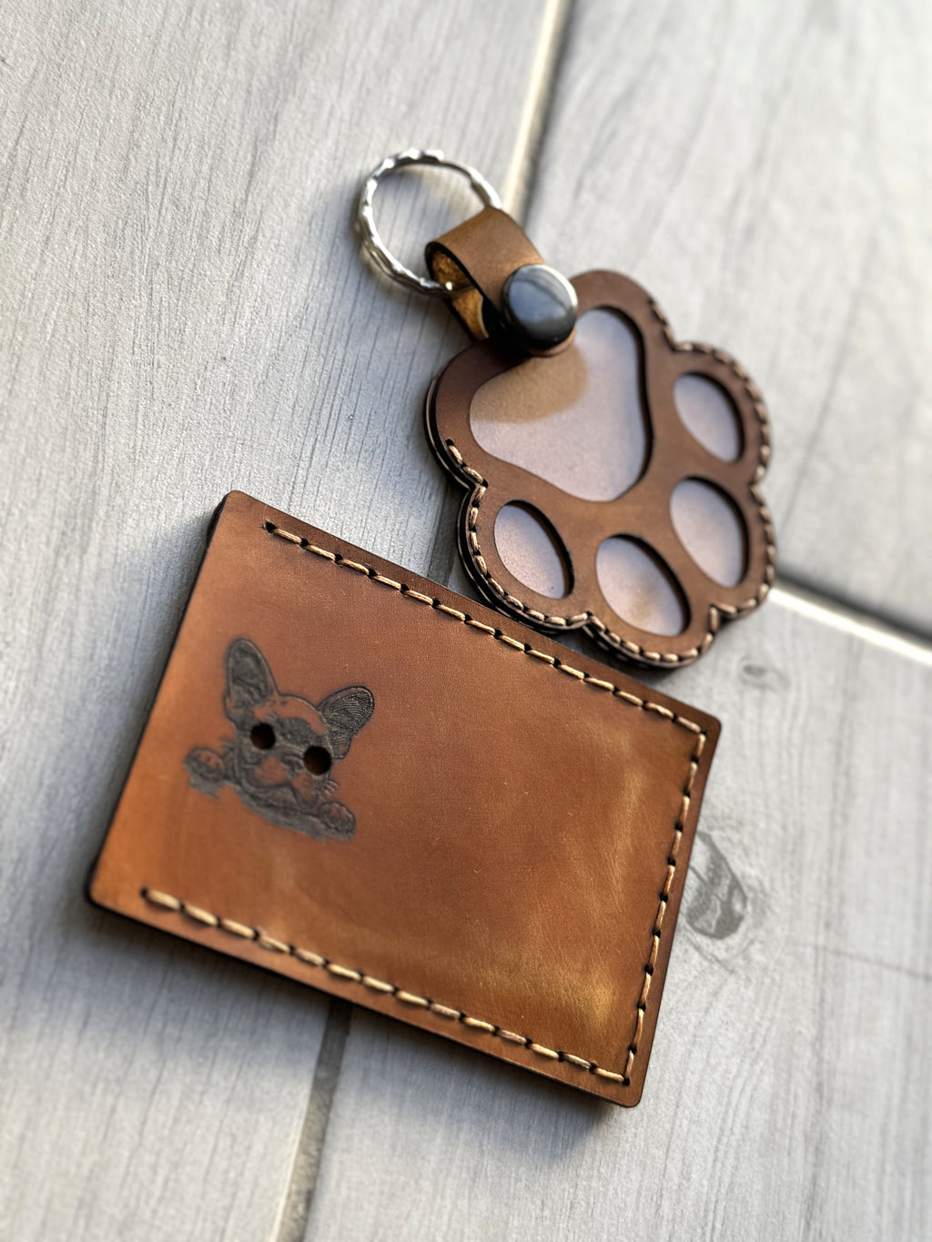Leather paw print pet memorial keychain keepsake — back view — Lamamarka