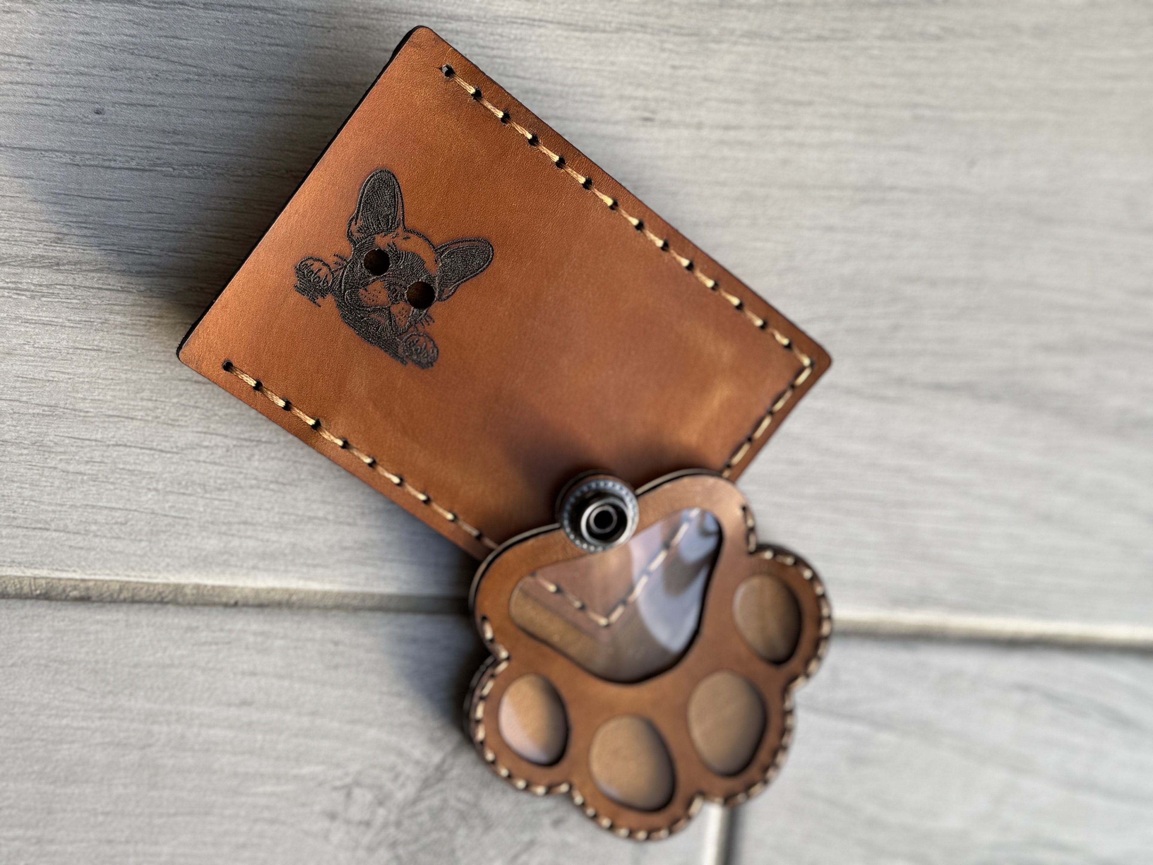 Leather paw print pet memorial keychain keepsake — close-up — Lamamarka