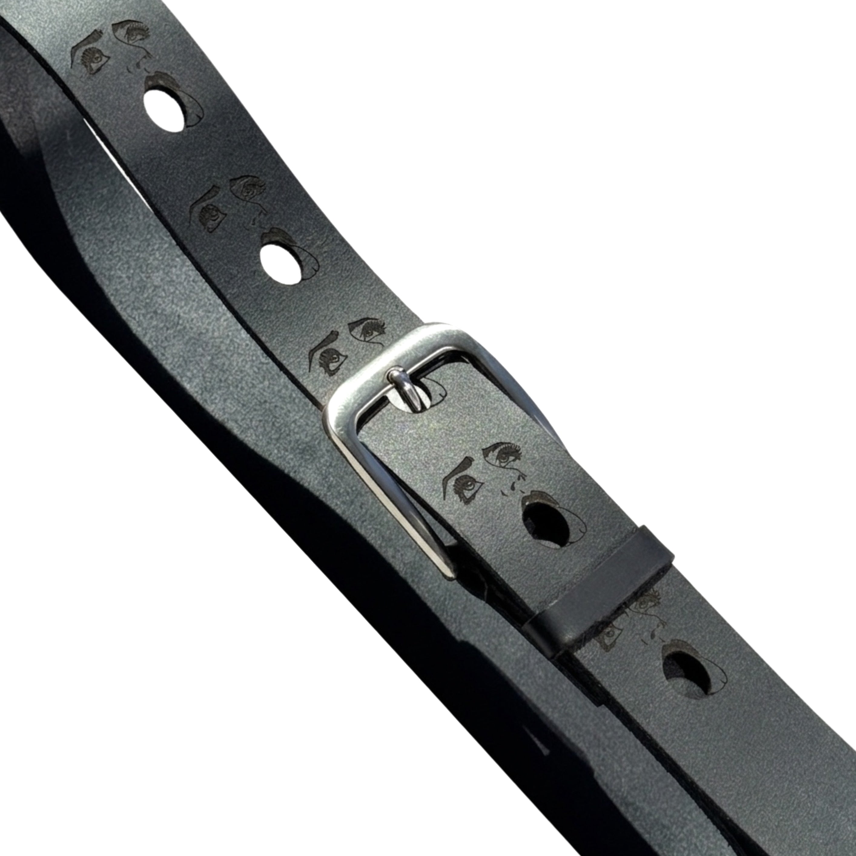 Brown handcrafted engraved leather belt — in-hand view — Lamamarka