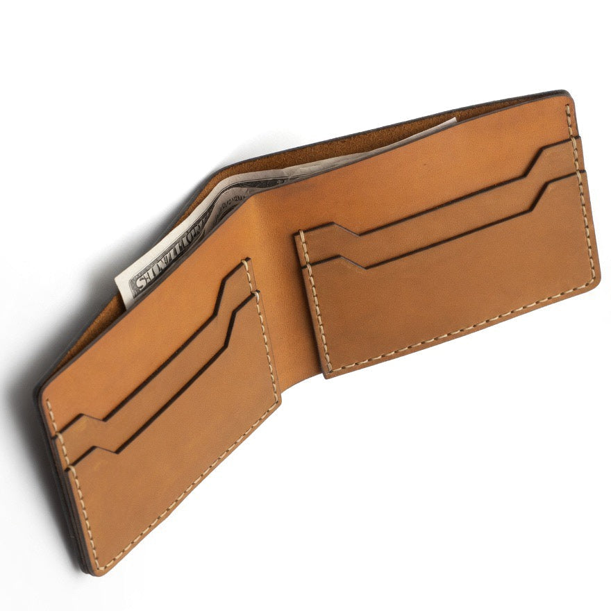 Handcrafted leather bifold wallet with cave-art engraving — alternate angle — Lamamarka