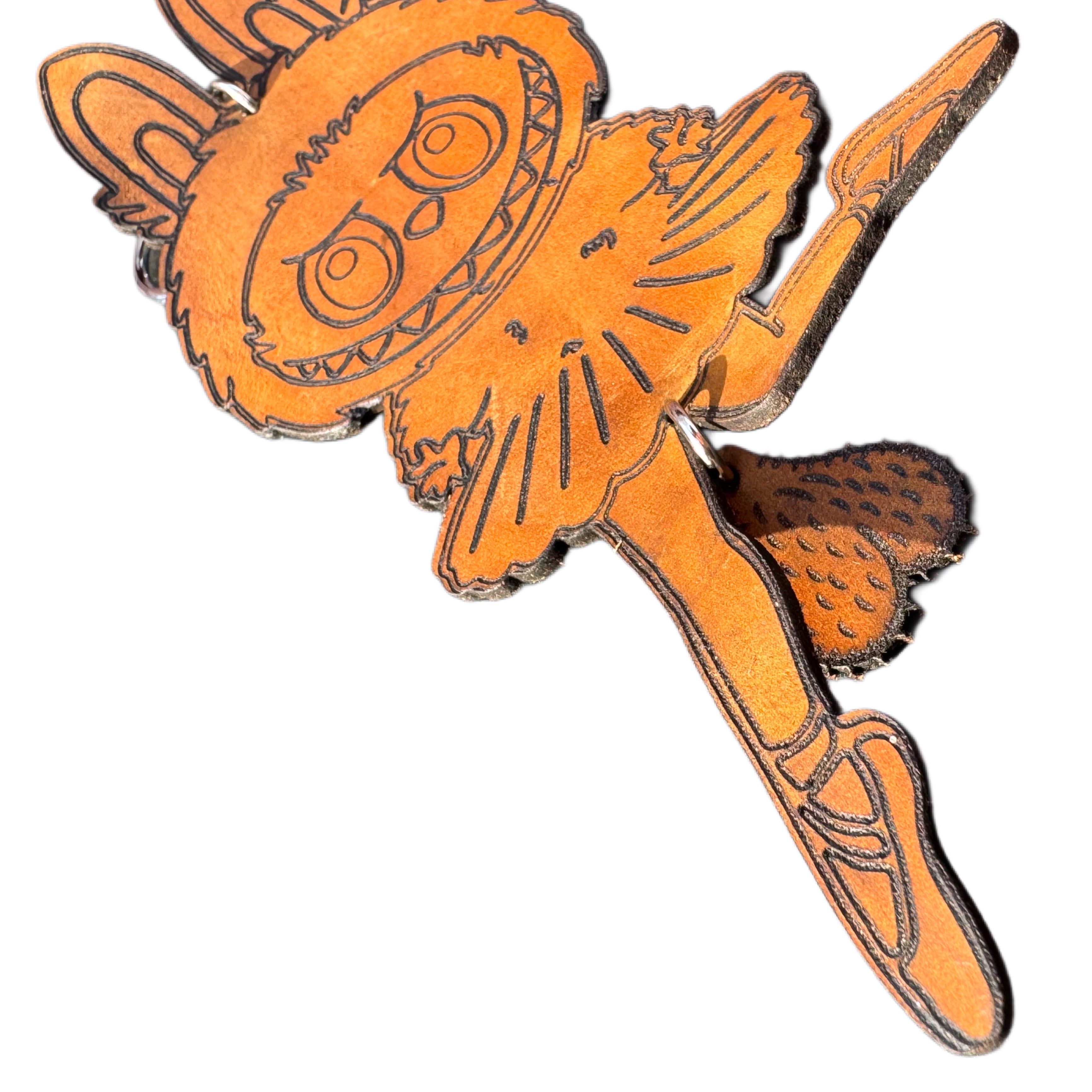 Handcrafted leather character keychain — alternate angle — Lamamarka