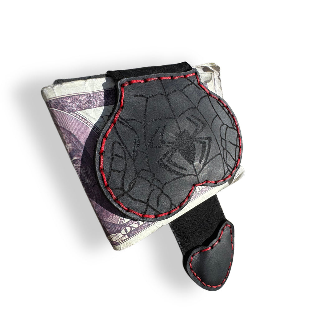Tooled spider emblem detail on an all black XL leather magnetic money clip