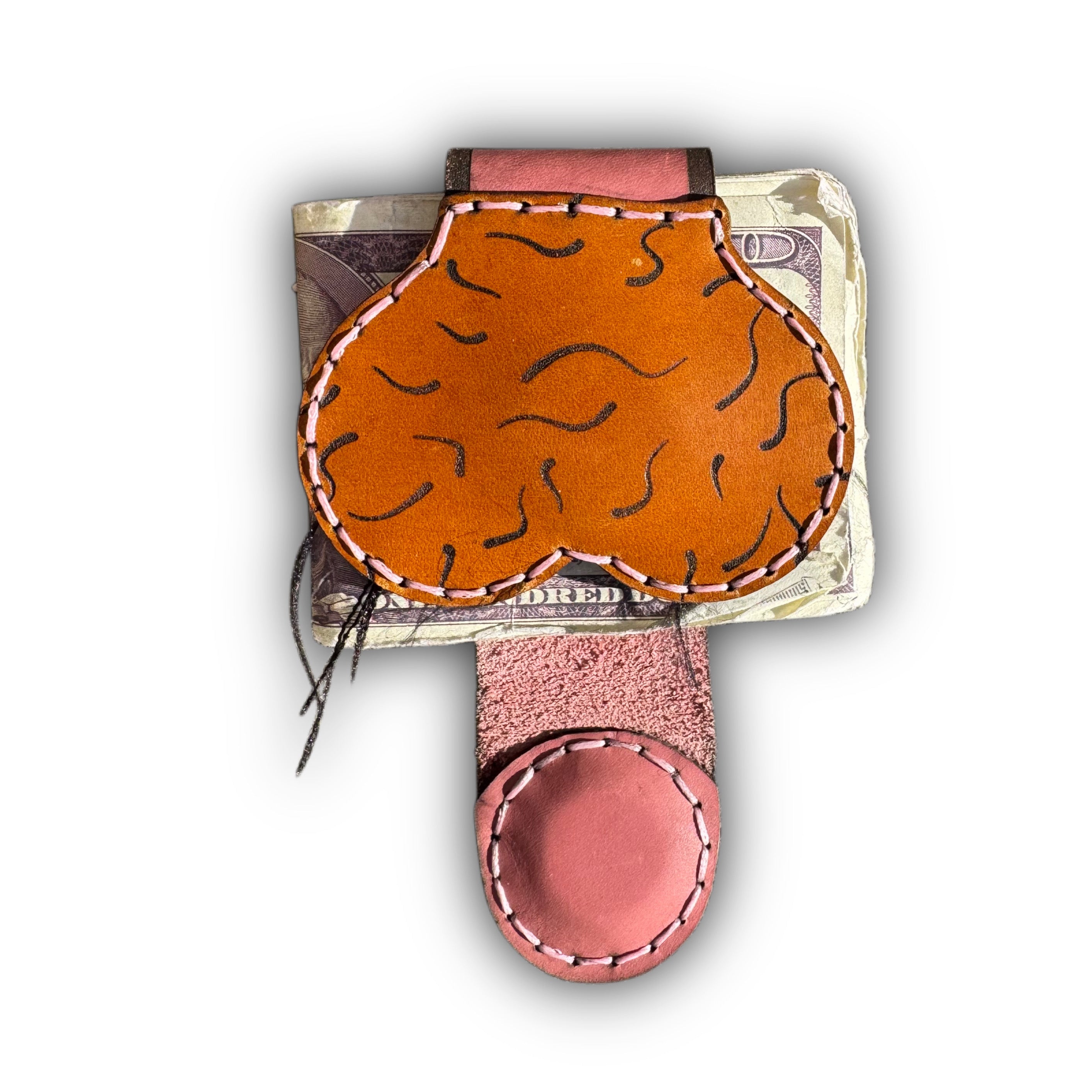 Au naturel XL leather money clip front, tan panel tooled all over with hair marks and stitched in pink, holding folded banknotes