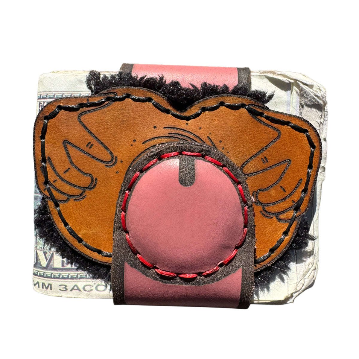Black hole XL leather money clip front, engraved hands on tan base, pink strap tip