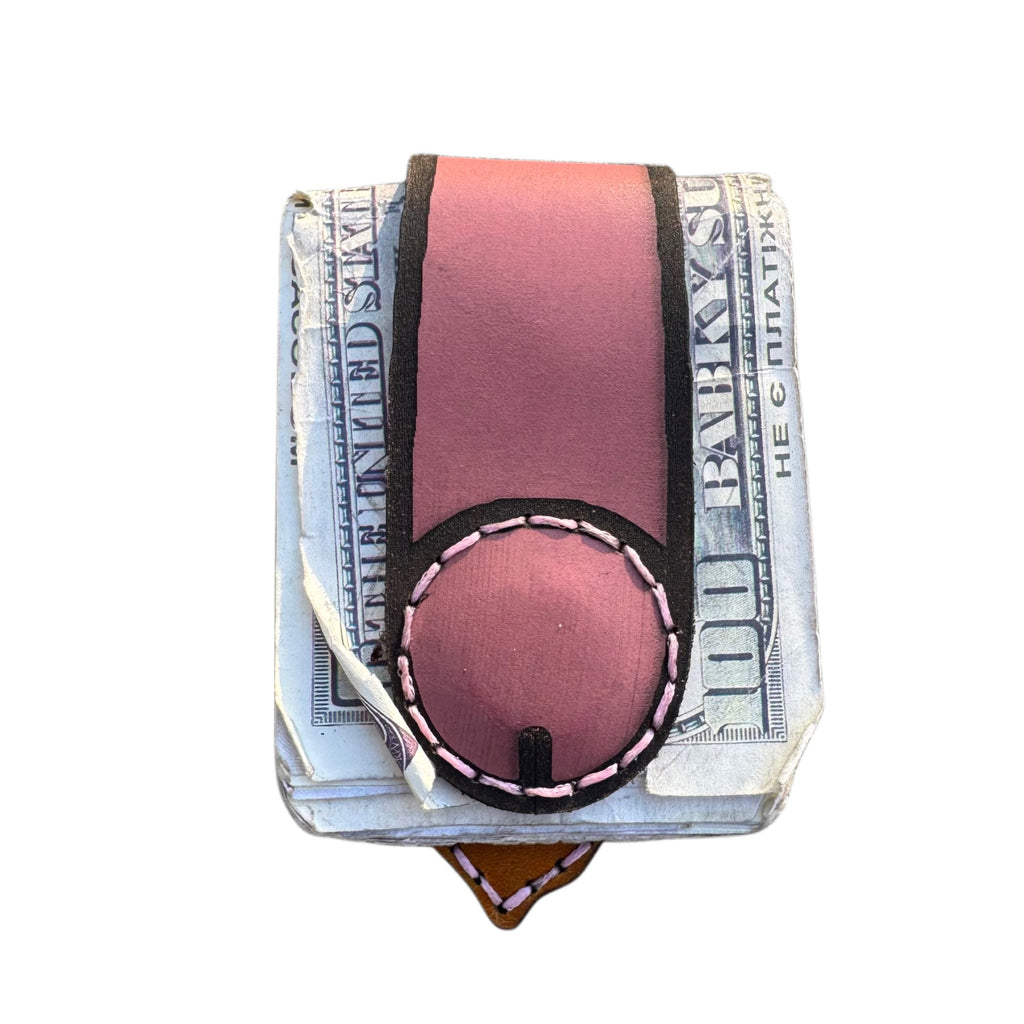 Dessert First money clip back, pink leather strap wrapped around folded cash