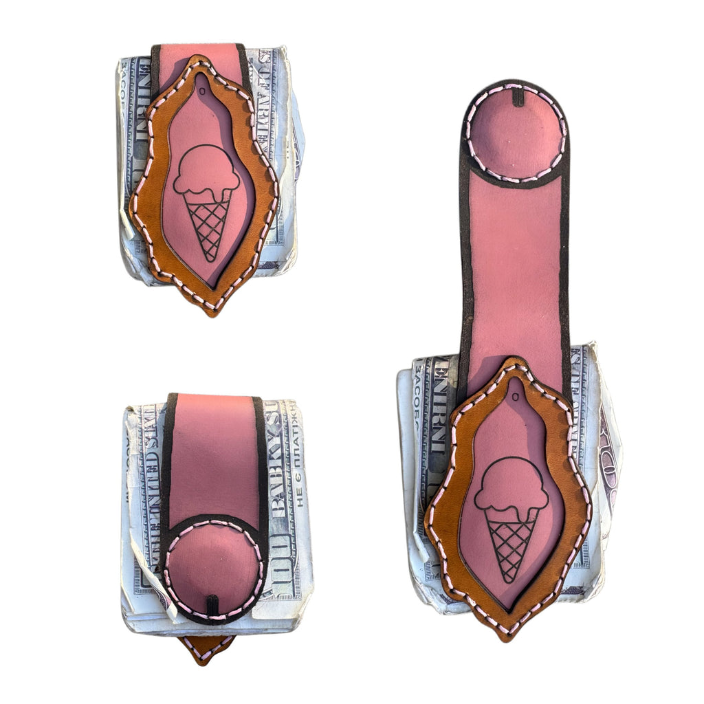 Dessert First leather money clip shown closed, open and extended over folded cash