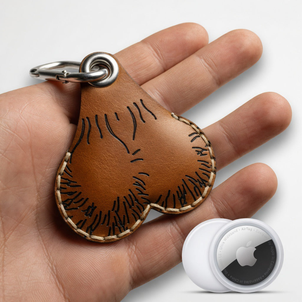 Lucky Pair handcrafted leather AirTag holder in light brown, novelty leather AirTag case by Lamamarka